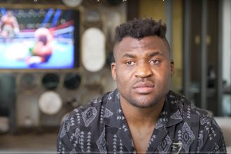 "Boxing World Divided: Fury's Win Over Ngannou Sparks Debate and Desire for Rematch!"
