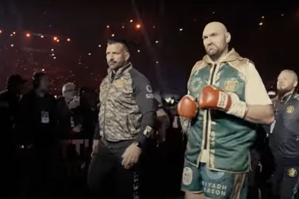 "Golden Boy Sounds Alarm: Jake Paul's Challenge Threatens Tyson's Legacy"