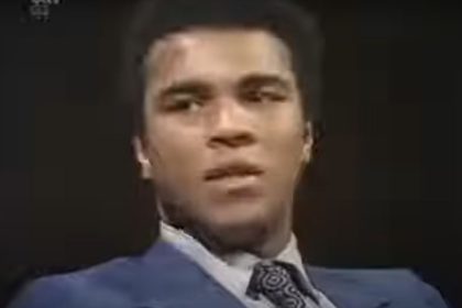 "From the Ring to the Mat: Muhammad Ali's Unforgettable Journey Through Pro-Wrestling"