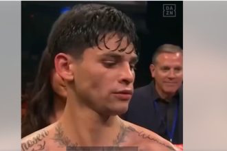 "Garcia's Ear-Bite Threat Sends Shockwaves Through Boxing World: Holyfield Reacts With Disbelief!"