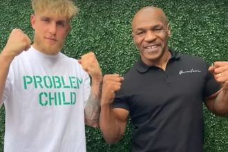 "The Battle of Generations: Tyson vs. Paul Clash Erupts with Holyfield's Warning and Rahman Jr.'s Endorsement!"