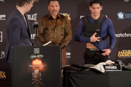 "Garcia and Tate's Unlikely Bond: Boxing Sensation Seeks Guidance Amid Social Media Turmoil!"