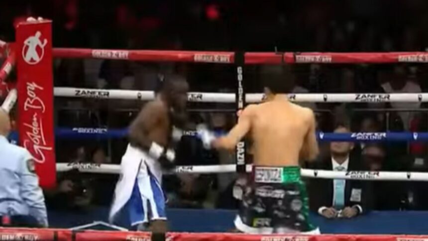 "Espinoza’s Brutal Beatdown: Featherweight King Retains WBO Title in Stunning Fashion"