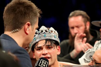 "Beer-Soaked Chaos: Ryan Garcia and Caleb Plant's Explosive Showdown at Gervonta Davis Fight"