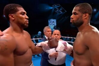 "Joshua vs. Dubois: Will AJ's Chin Hold Up Against the Heaviest Puncher Yet?"