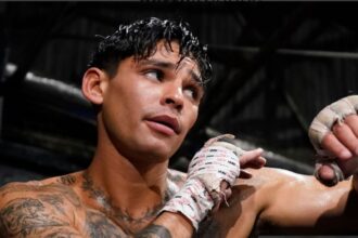 "Ryan Garcia and Ishe Smith's Explosive Online Clash: A Tale of Accountability and Accusations"