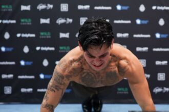 "Hotel Havoc: Garcia, Davis, and Haney’s Convergence Sparks Calls for Parking Lot Showdown"