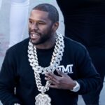 "Silent Storm: Mayweather's Bold Move Amid Garcia's Controversy"