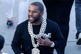 "Silent Storm: Mayweather's Bold Move Amid Garcia's Controversy"