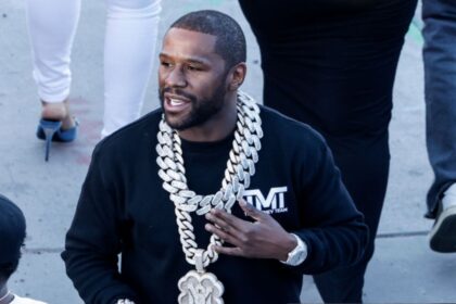 "Silent Storm: Mayweather's Bold Move Amid Garcia's Controversy"