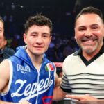 "Oscar De La Hoya Faces Double Trouble: Canelo and Haney Slam Promoter Over Pay Dispute"