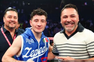"Oscar De La Hoya Faces Double Trouble: Canelo and Haney Slam Promoter Over Pay Dispute"