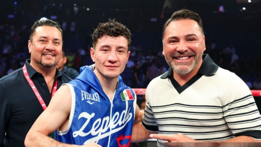 "Oscar De La Hoya Faces Double Trouble: Canelo and Haney Slam Promoter Over Pay Dispute"
