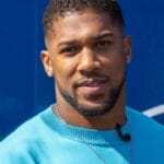 "Anthony Joshua Stuns Fans with Rap Performance Ahead of Title Clash with Daniel Dubois"