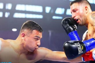 "Leo Delivers a Devastating Left Hook to Secure IBF Featherweight Title in Hometown Triumph"