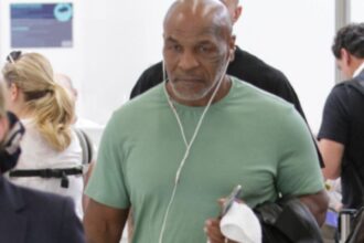 “From Rivals to Partners: Tyson and Holyfield Reunite with a Legendary Twist Ahead of Jake Paul Fight”