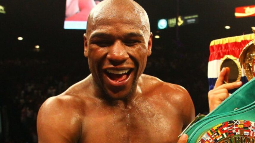 “Mayweather’s WWE-Style Fight Sparks Outrage: Fans Call for Boycott After Referee Drama”