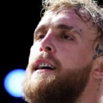 "Jake Paul's Mockery of Mike Tyson's Shoes Sparks Fierce Debate Ahead of Their Epic Showdown''