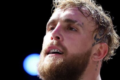 "Jake Paul's Mockery of Mike Tyson's Shoes Sparks Fierce Debate Ahead of Their Epic Showdown''