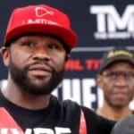 "Floyd Mayweather’s Mysterious Message Sets the Stage for Explosive Rematch with John Gotti III"